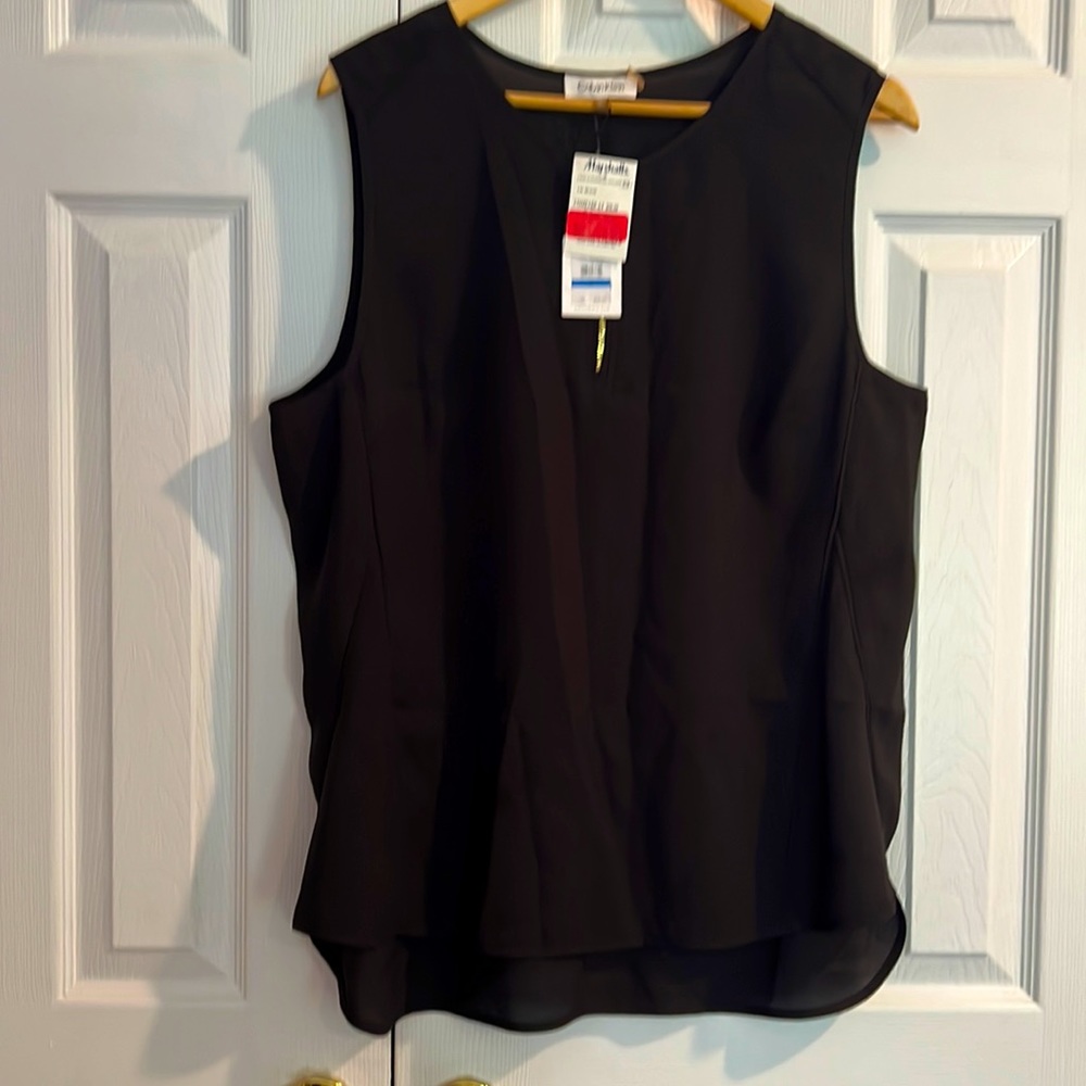 Never worn Calvin Klein tank top/shell.  Size XL, black with gold zip detail